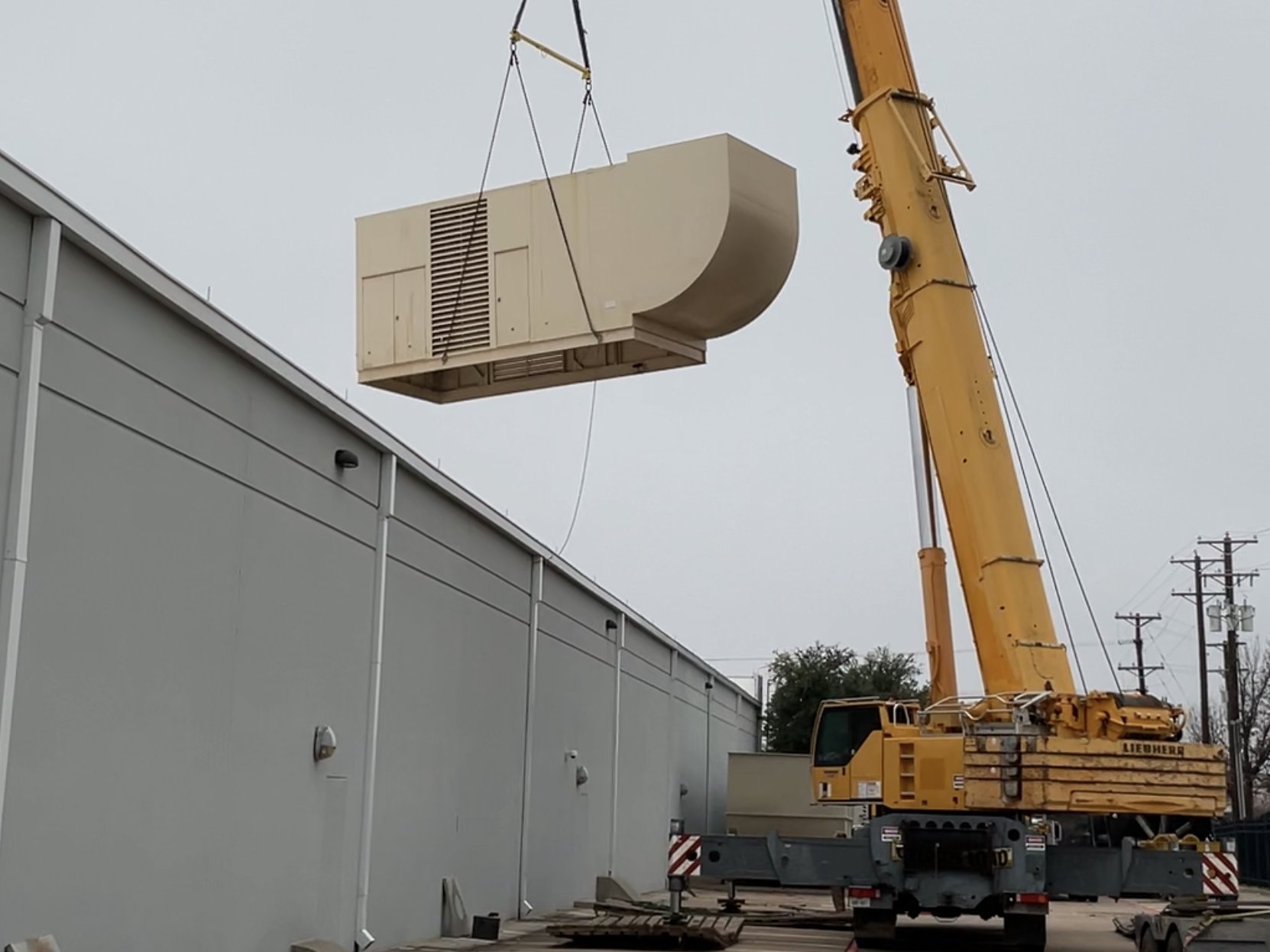 Crane lift of generator enclosure